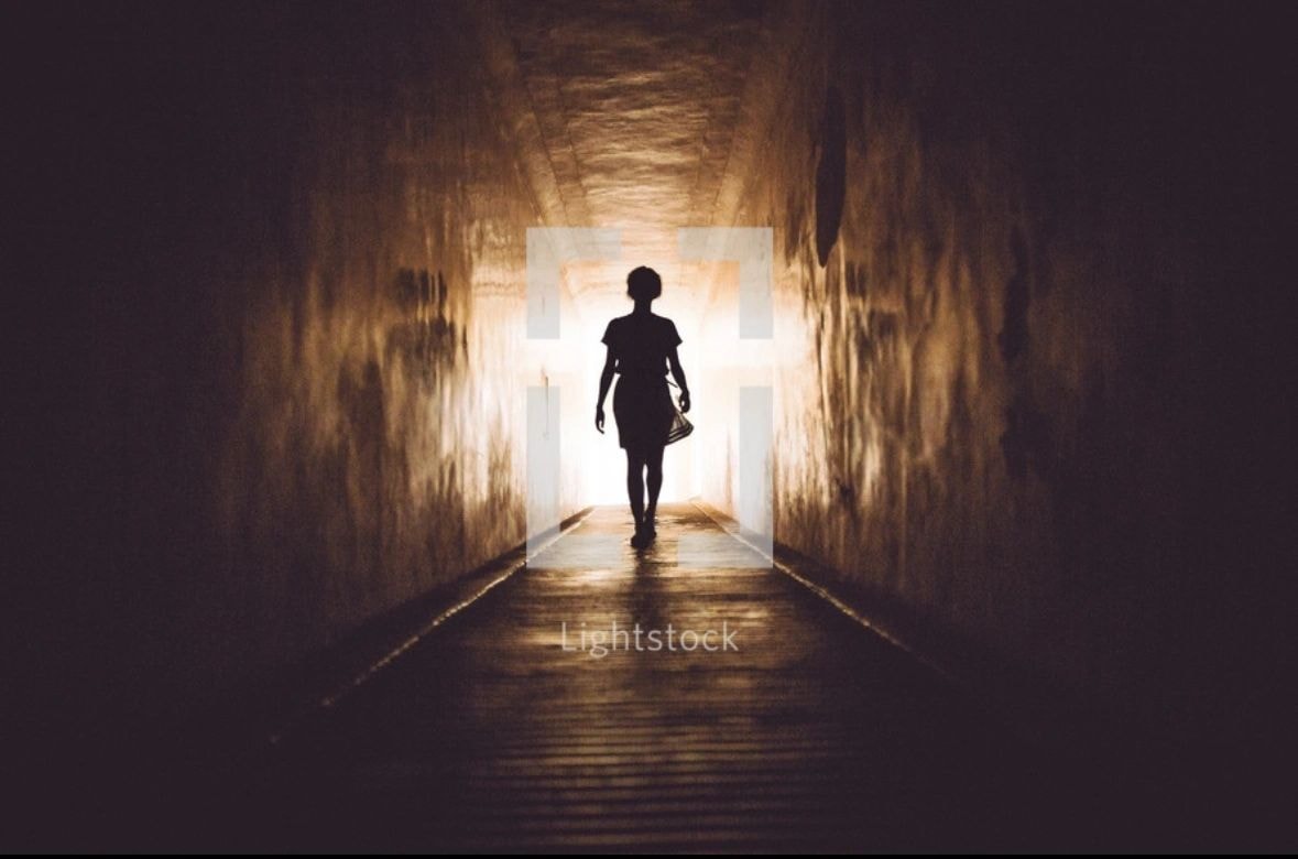 Runner heading toward light